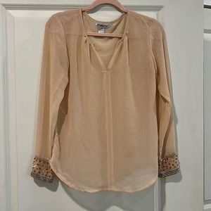 Sheer blouse with wrist beading